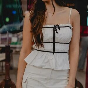 Storia White Peplum Top with Black Accents